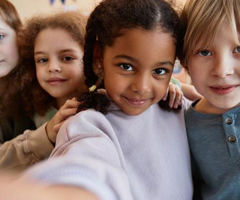 Group of children, looking at camera