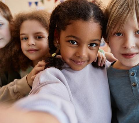 Group of children, looking at camera