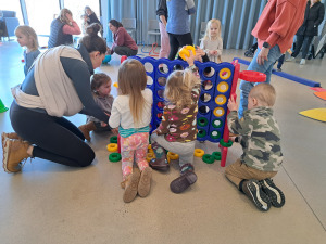 Children playing Connect Four.