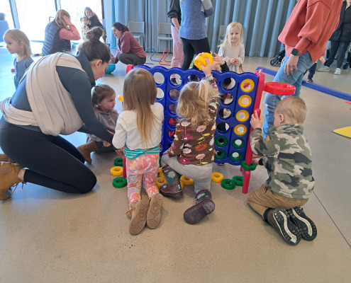 Children playing Connect Four.