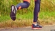 Photo depicts joggers feet in motion