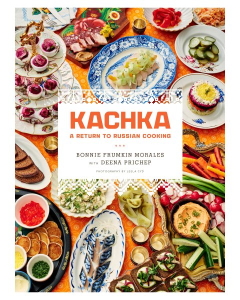 Cover of a cookbook, Kachka: A Return to Russian Cooking. Depicts a wide array of very colorful foods laid out on lovely china of different colors on top of a bright orange tablecloth. The effect is very pleasing and appetizing. 